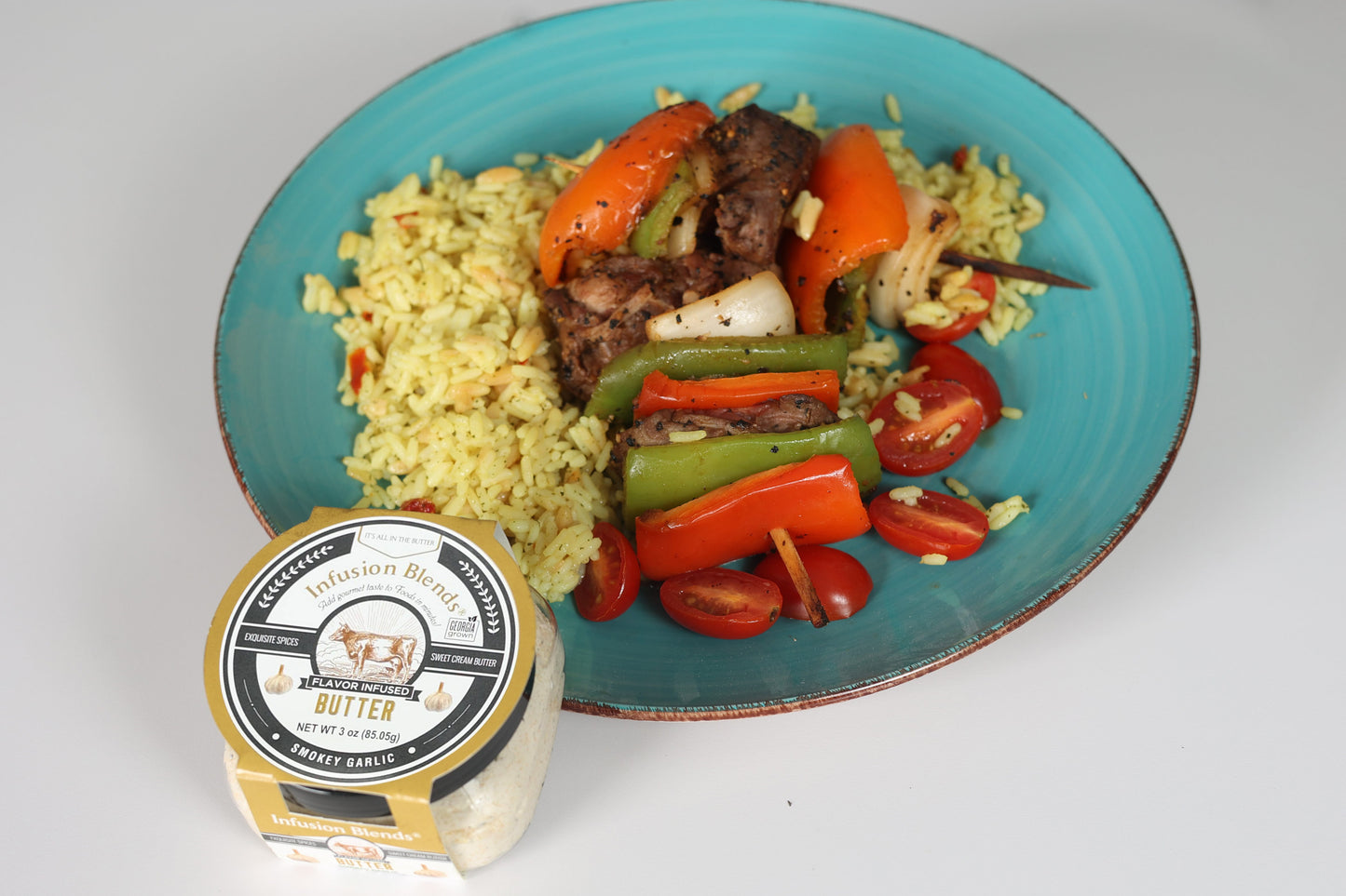 3 flavor-infused gourmet butter collection featuring garlic, Cajun, and honey butter by Infusion Blends