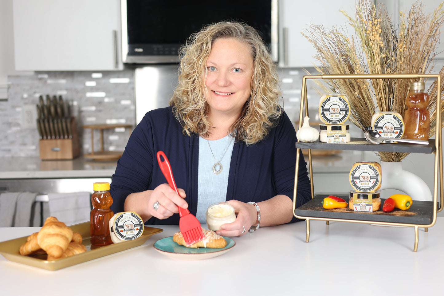 3 flavor-infused gourmet butter collection featuring garlic, Cajun, and honey butter by Infusion Blends